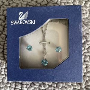 Brand new Swarovski matching necklace and earrings